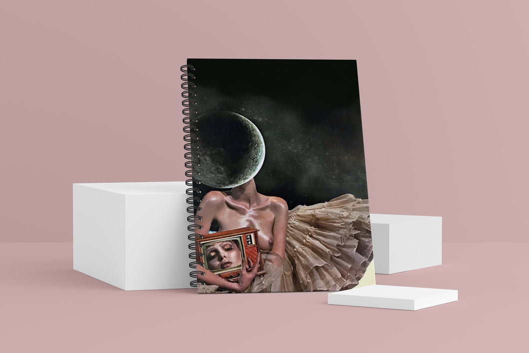 Homebound Wellness Journal. The cover shows a collage featuring a woman with a moon for a head, wearing a tutu, holding a television with her head in it.