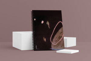 Solo Wellness Journal. The cover shows planet in the sky with moons
